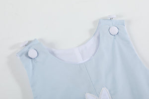 Blue fuzzy bunny overalls for babies, featuring a cute design and cozy fabric, perfect for playful outfits.