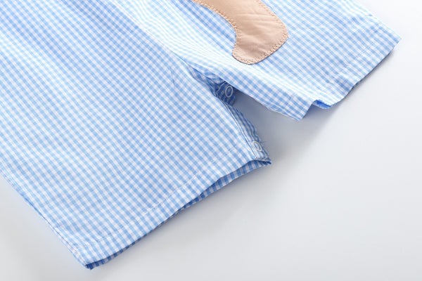 Blue gingham puppy shortalls for babies, showcasing a playful design from angle 5. Perfect for stylish little ones!