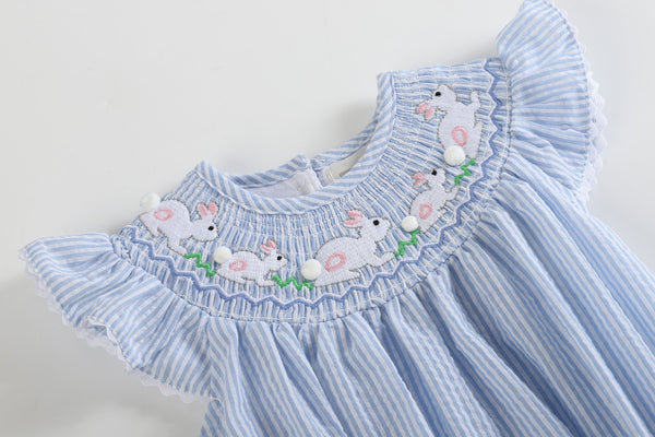 Blue Seersucker Bunny Smocked Flutter Romper for babies, angle view showcasing cute design and soft fabric.