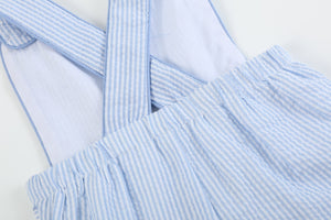 Blue seersucker Easter bunny shortalls for babies, featuring a cute design and comfortable fit. Angle 2 view.