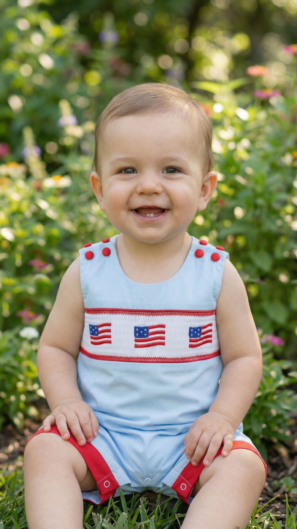 Blue USA Flag Smocked Shortalls for babies - stylish and patriotic romper for little ones.