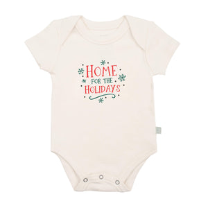 Graphic bodysuit for babies, "Home for the Holidays," perfect for festive occasions. Short sleeve design.