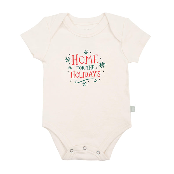Graphic bodysuit for babies, "Home for the Holidays," perfect for festive occasions. Short sleeve design.