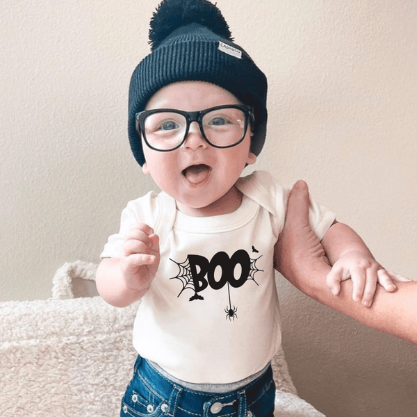 Graphic bodysuit for babies in BOO design, short sleeve, angle view showcasing playful style and comfort.