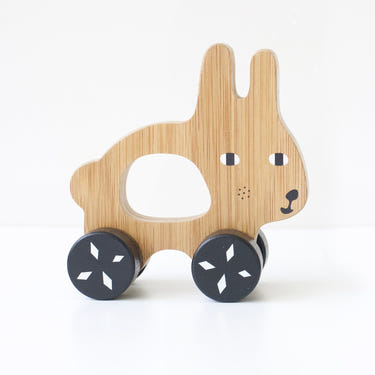 Bunny Push Toy made of wood and bamboo, perfect for toddlers to enhance playtime and motor skills.