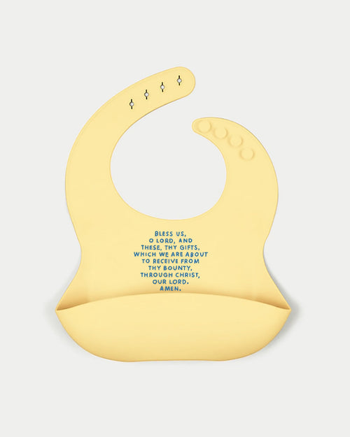 "Meal Blessing Silicone Bib at a 20-degree angle, perfect for mess-free feeding and easy cleanup for babies."