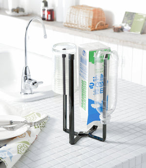 Collapsible steel bottle dryer at angle 11, perfect for efficient drying of baby bottles and accessories.