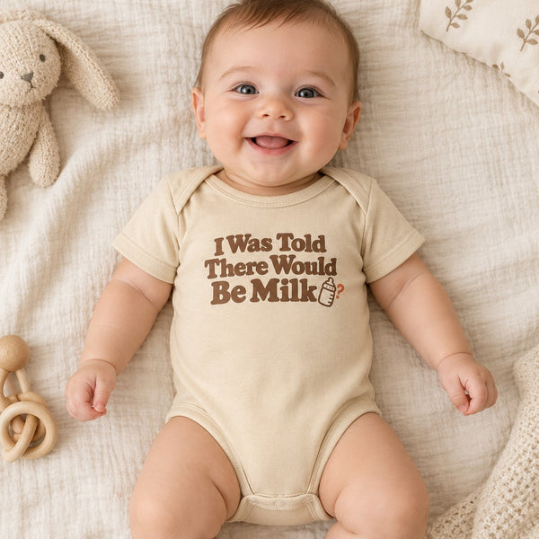 Baby wearing the I Was Told There Would Be Milk baby bodysuit
