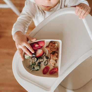 Rainbow Silicone Suction Plate for babies, perfect for mealtime mess-free feeding.