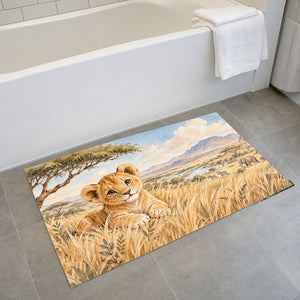 Lion Cub Safari bath mat on the floor in front of the tub