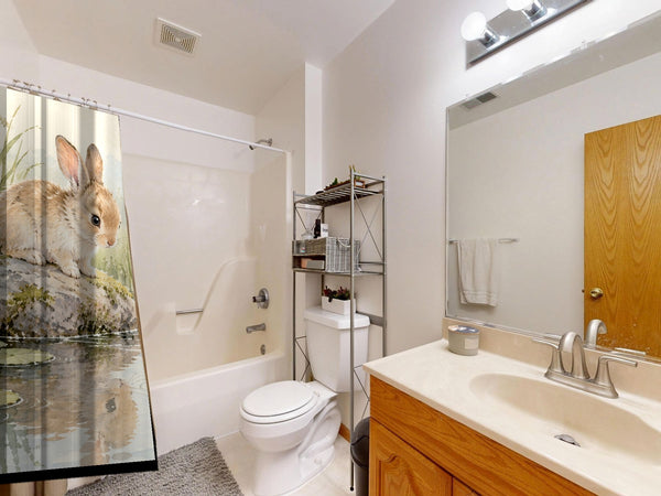 Quiet Garden Pond Bunny shower curtain on a tub shower combo in an American family bathroom