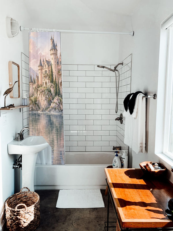 Lakeside Castle Fairy Tale shower curtain hanging on the rod over a white bathtub