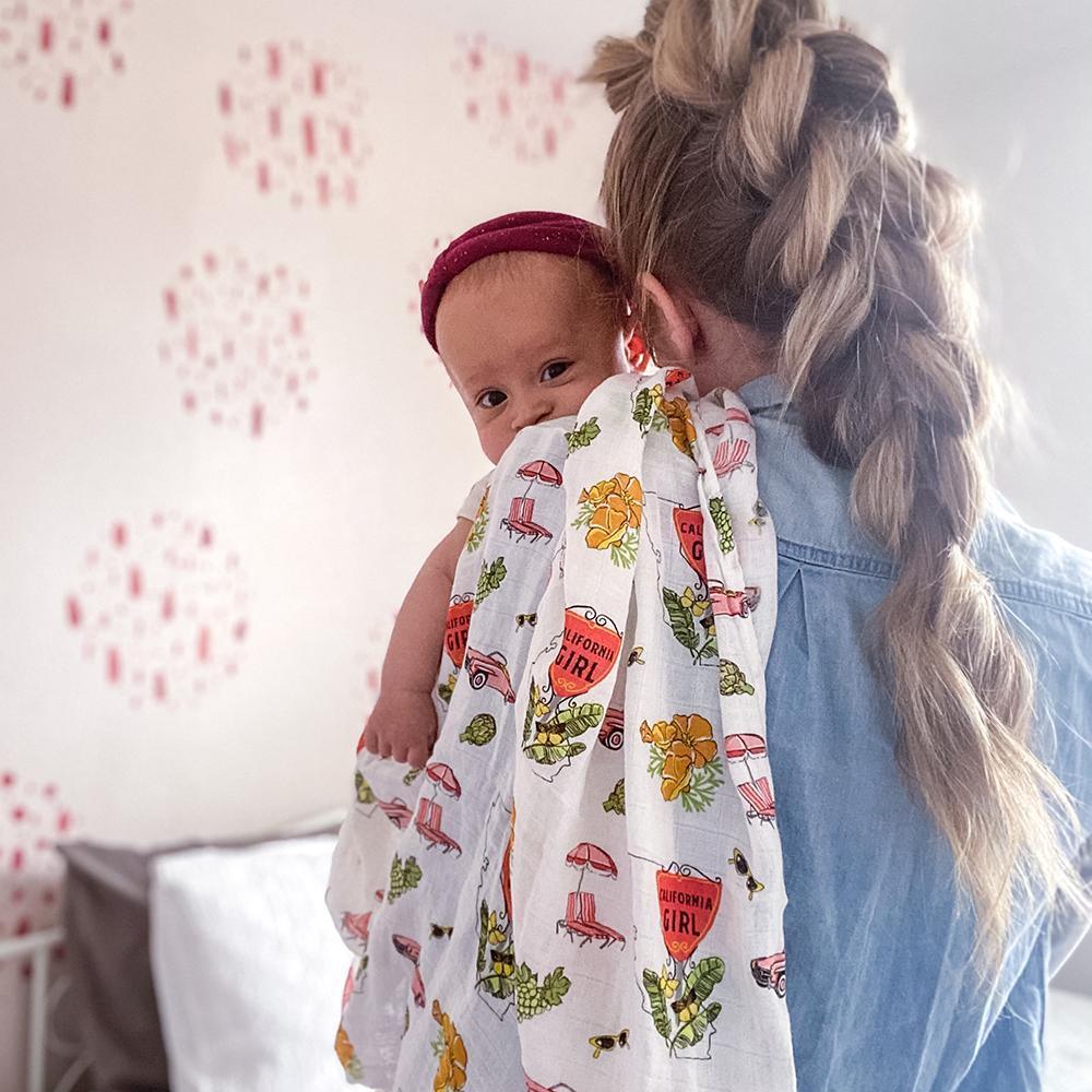 California Girl Muslin Swaddle Blanket and Burp Cloth/Bib Combo gift set for babies, perfect for swaddling and feeding.