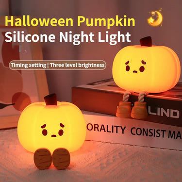 Cute silicone pumpkin night light, dimmable and rechargeable, perfect for kids' Halloween decor and bedside use.