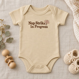Nap Strike In Progress baby bodysuit in natural