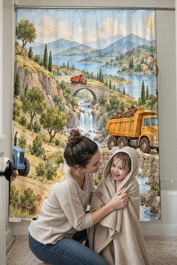 Mom drying her toddler in a hooded towel in front of the Vehicle Landscape shower curtain