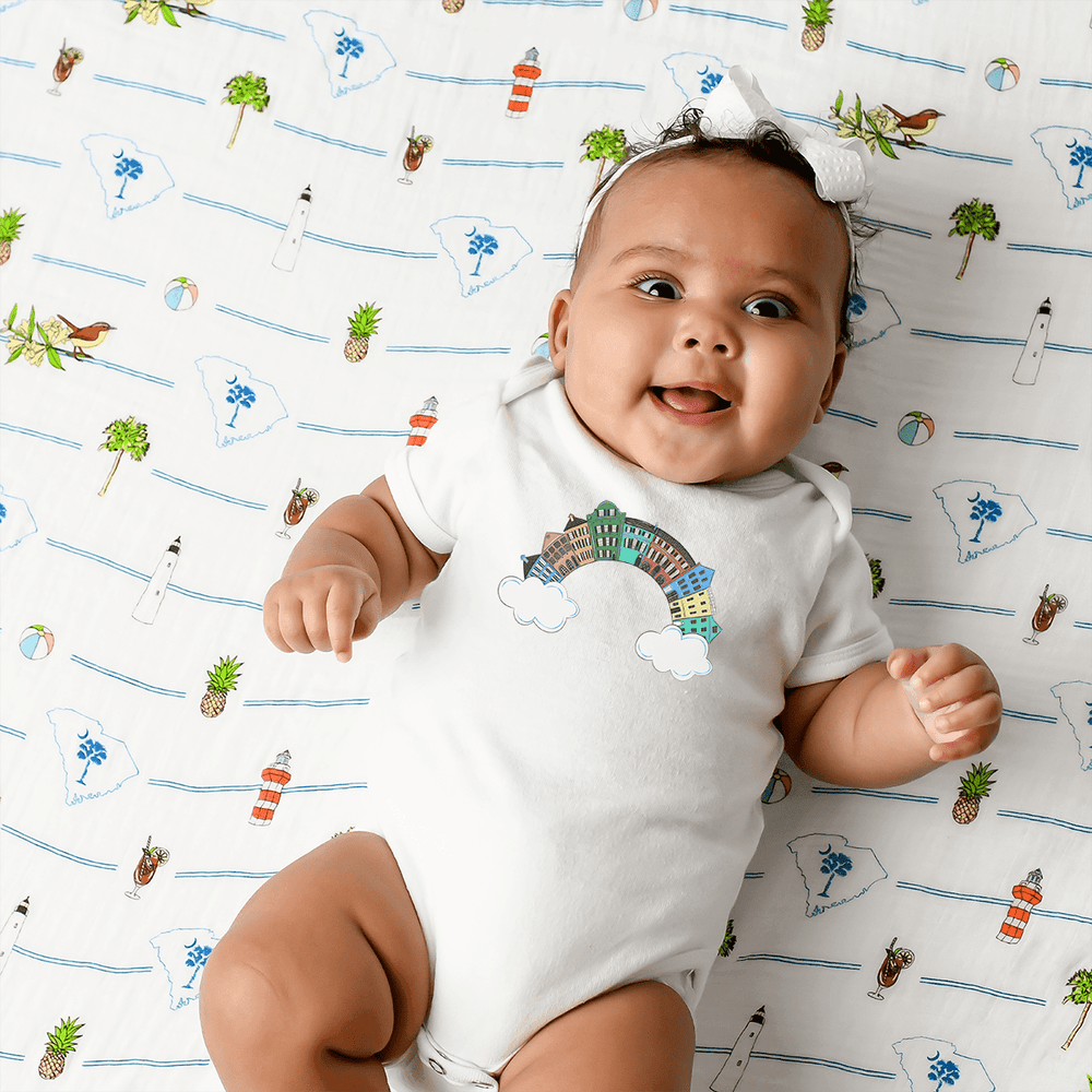 Charleston Rainbow Row Baby Onesie - Colorful short sleeve bodysuit for infants, perfect for playful outings.