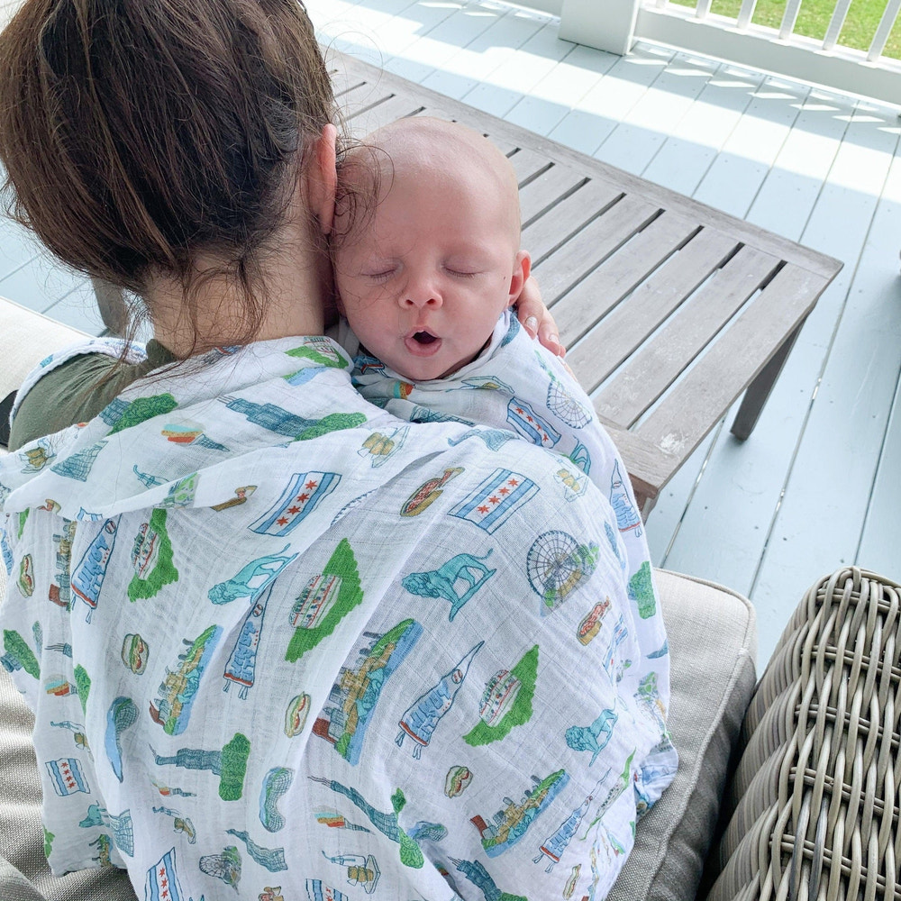 Chicago Baby Muslin Swaddle Blanket and Burp Cloth/Bib Combo gift set for infants, perfect for swaddling and feeding.
