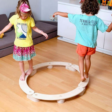Circular Wooden Balance Beam Set for babies, Montessori-inspired, enhancing balance and coordination skills.