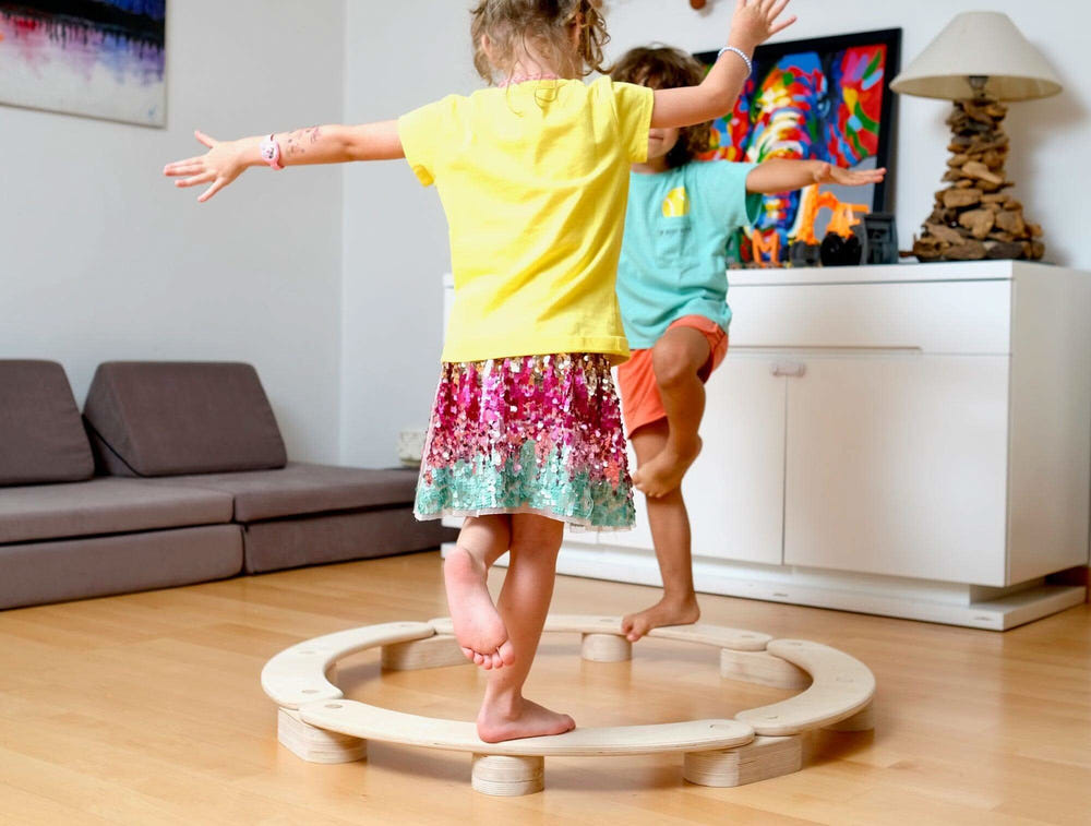 Circular Wooden Balance Beam Set for babies, Montessori-inspired, enhancing balance and coordination skills.