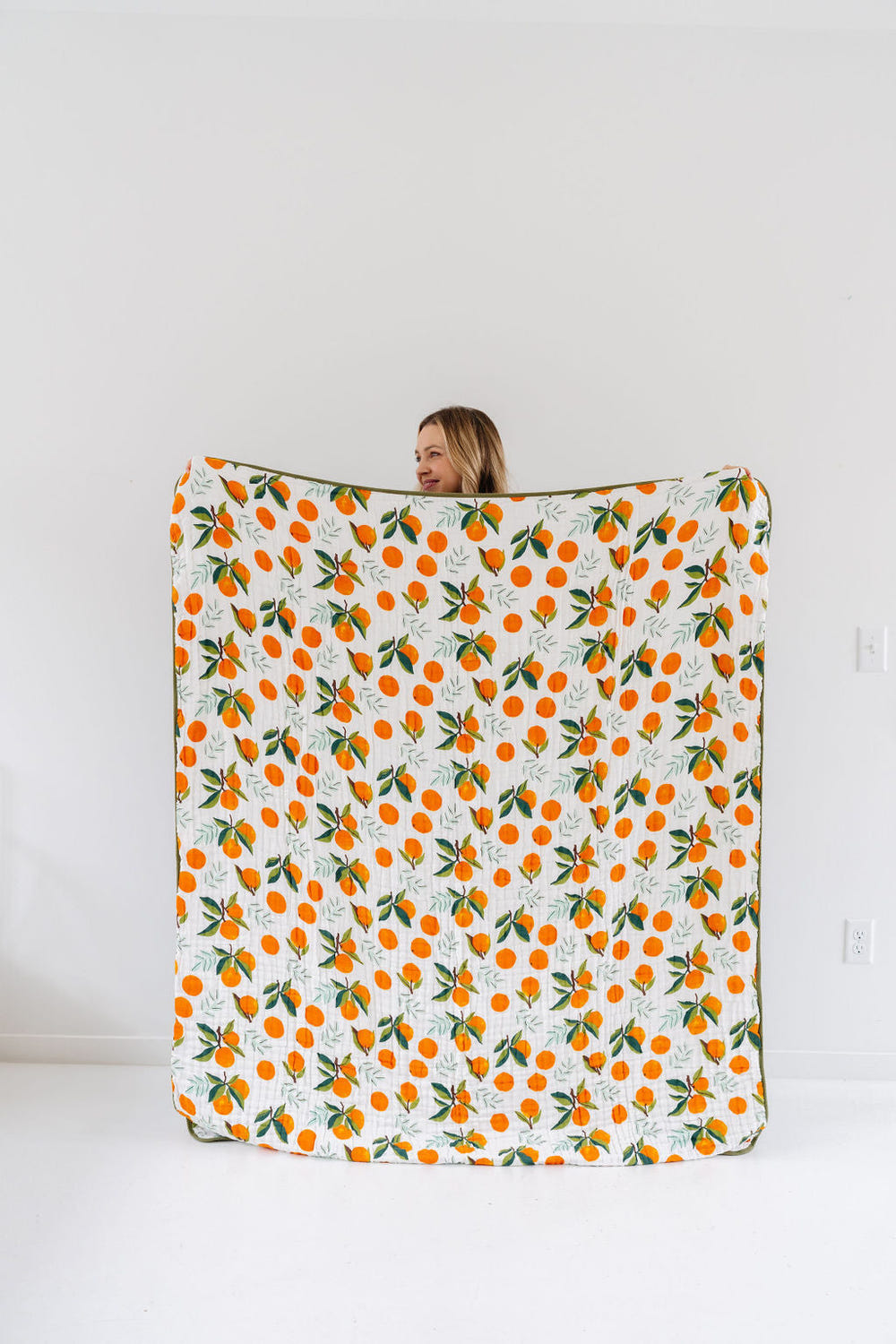Clementine Throw Blanket - Cozy quilt for babies, perfect for warmth and comfort in nursery or playtime.