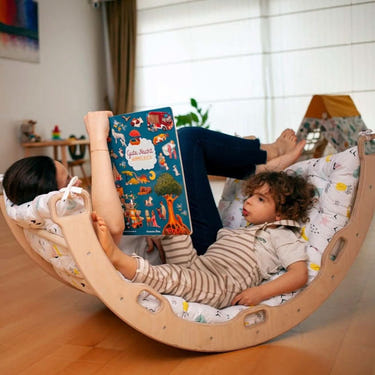 Climbing Arch with Flamingo Pillow - Montessori play set for active babies and toddlers, promoting physical development.
