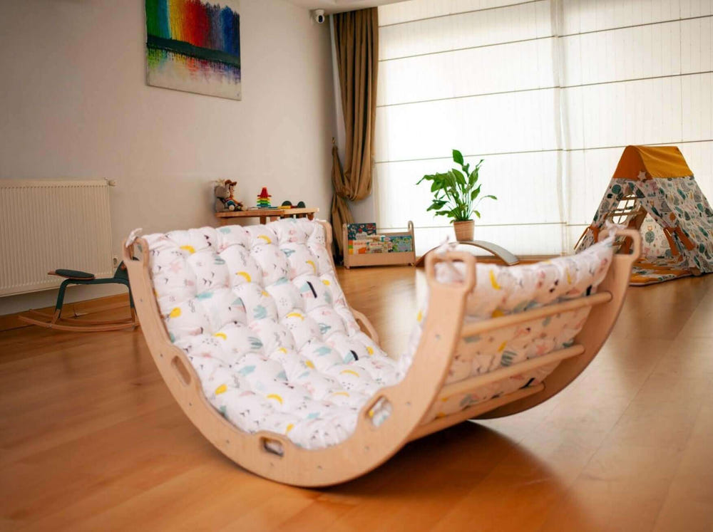 Climbing Arch with Flamingo Pillow - Montessori play set for active babies and toddlers, promoting physical development.