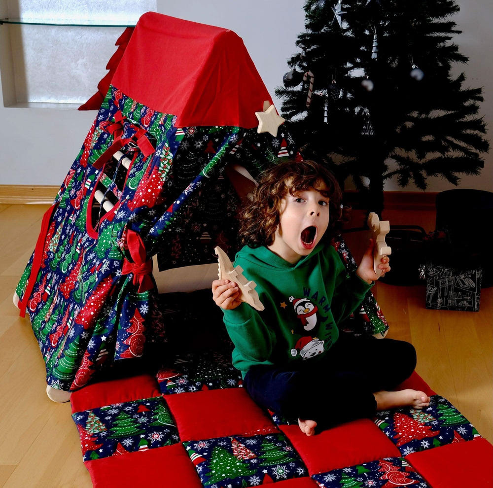 Climbing triangle play set with Christmas tent cover, mat, and ramp for Montessori-inspired fun.