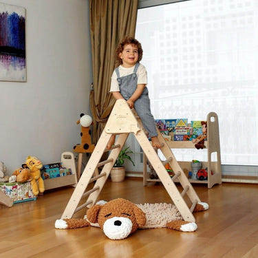 Montessori climbing triangle with rocker and jungle pillow, foldable activity gym set for babies and toddlers.
