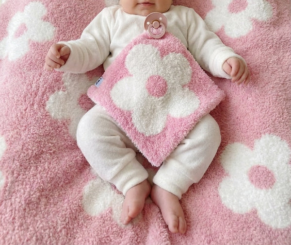 Pink Daisy Plush Lovey for babies, soft and cuddly, perfect for comfort and companionship. Angle 2 view.