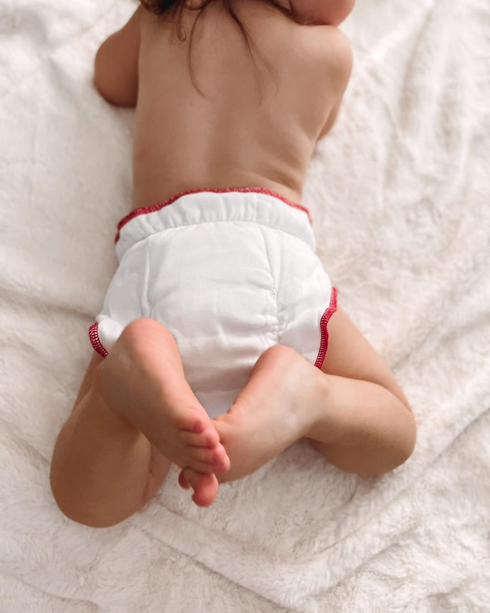 Cotton fitted cloth diaper bundle with snaps and two inserts for ultimate comfort and convenience.