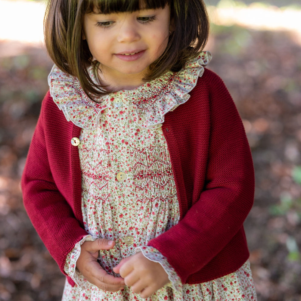Girls burgundy knitted cotton cardigan by COLETTE for babies and toddlers. Cozy and stylish outerwear option.