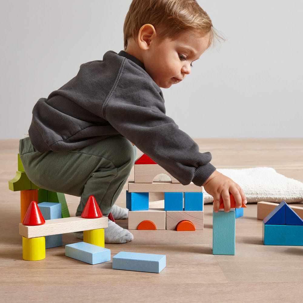 Colored wooden building blocks set - 46 pieces for creative play and architectural fun for babies and toddlers.