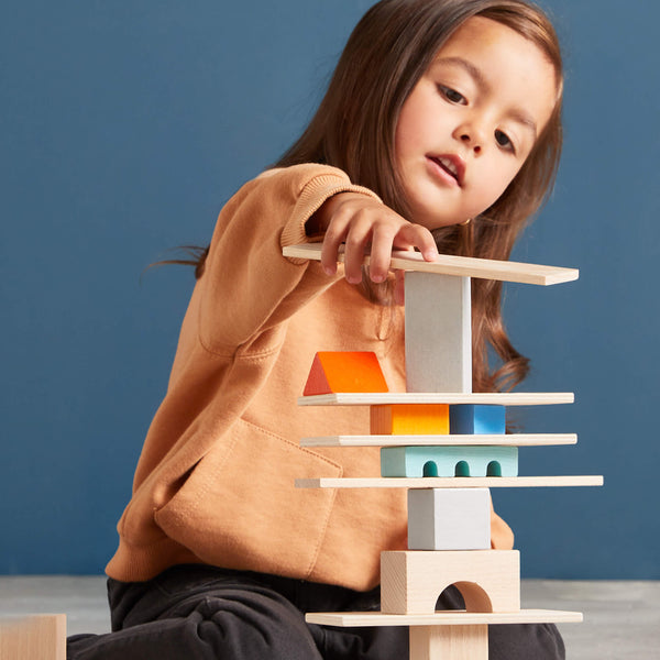 Colored wooden building blocks set, 85 pieces, displayed at angle 3 for creative architectural play.