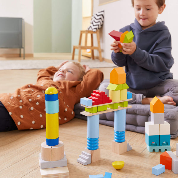 Colored wooden building blocks set - 85 pieces, perfect for creative play and architectural design for babies and toddlers.