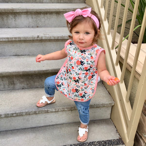 Vintage Rose Bapron for babies, stylish and practical, shown at a 10-degree angle.