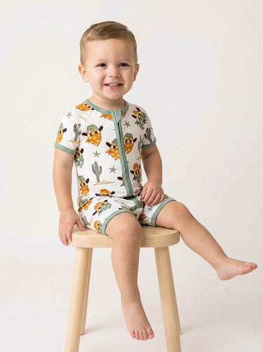 Bamboo Shorty Romper in Smiley Cowboy design for babies, perfect for stylish and comfortable playtime.