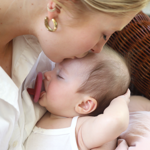 mōmi babypace® breast-like pacifier in rich cranberry red