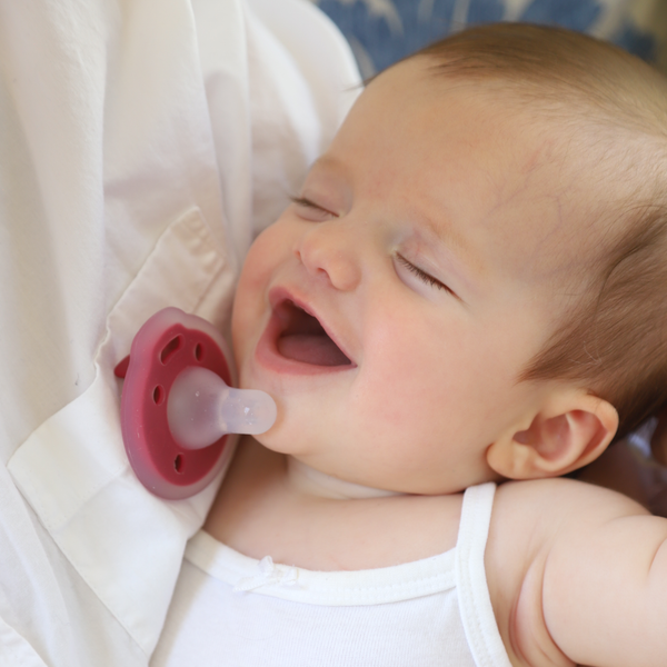 mōmi babypace® breast-like pacifier in multiple vibrant colors