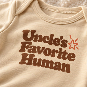 Close-up of the Uncle's Favorite Human baby bodysuit print