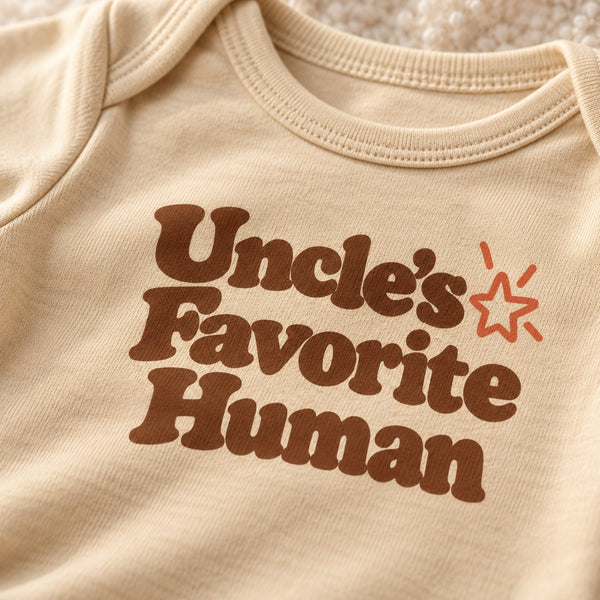 Close-up of the Uncle's Favorite Human baby bodysuit print