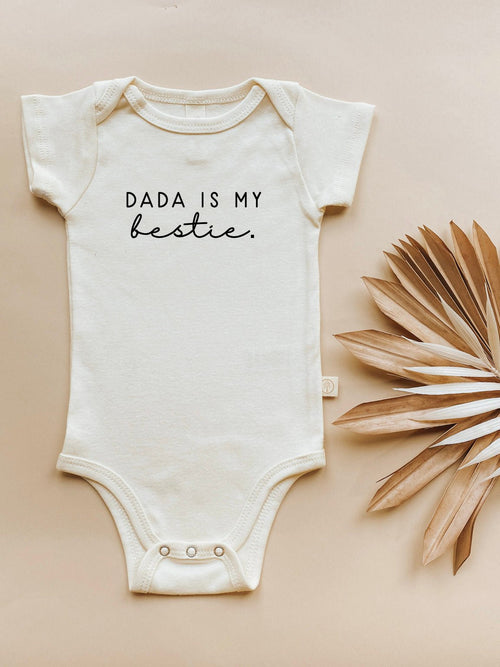 Dada is My Bestie Organic Baby Bodysuit in short sleeve, angle view showcasing soft fabric and cute design.