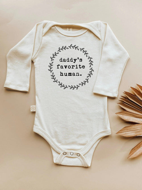 Daddy's Favorite Human Organic Long Sleeve Bodysuit for babies, angle view showcasing soft fabric and cute design.