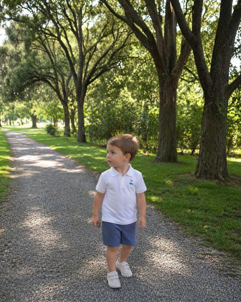 Dark blue boys' pocket shorts, perfect for casual summer outings and everyday wear.