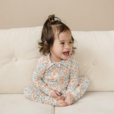 Darling Ditsy Bamboo Zippy Romper for babies in a cute floral design, perfect for comfort and style.