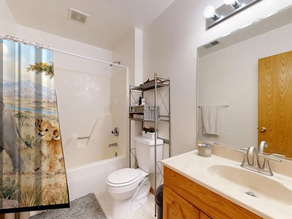 Safari Parade shower curtain on a tub shower combo in an American family bathroom