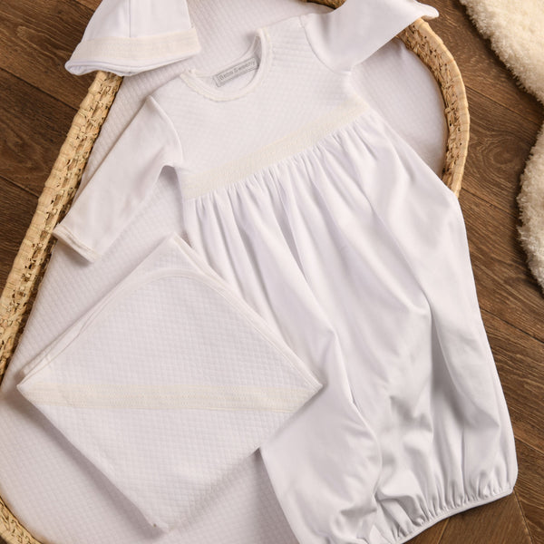 Baby white quilted cotton gown from angle 3, perfect for cozy and stylish outfits for infants and toddlers.