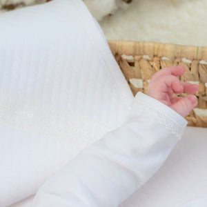 Baby white quilted cotton gown from angle 5, perfect for cozy and stylish outfits for infants and toddlers.