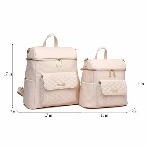 Pastel pink Petit Diaper Bag at angle 11, stylish and functional for modern parents.