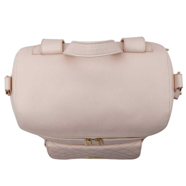 Pastel pink Petit Diaper Bag at angle 7, stylish and functional for modern parents.